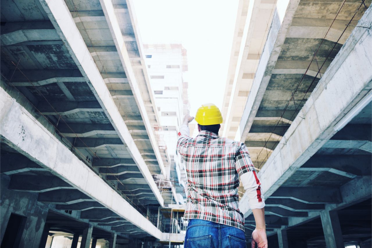 A contractor observing construction work
